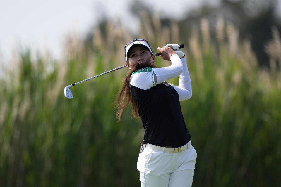 Atthaya Thitikul, of Thailand, watches her tee shot on the 15th hole during the first round of the ShopRite LPGA Classic golf tournament, Friday, June 9, 2023, in Galloway, N.J. (AP Photo/Matt Slocum)