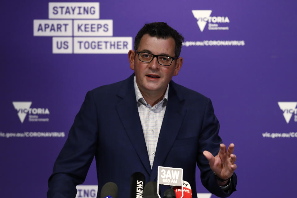 Dan Andrews at a press conference