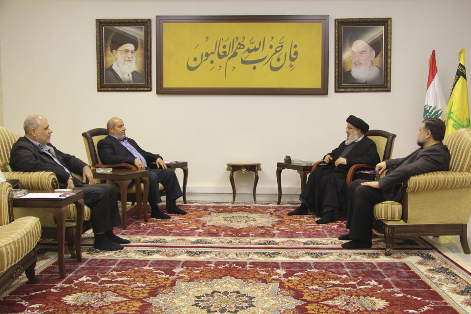 In this picture released on Wednesday, May 15, 2024, by Hezbollah media relations office, Hezbollah leader Sayyed Hassan Nasrallah, second right, meets with the high-ranking Hamas official Khalil al-Hayya, second left, in Beirut, Lebanon. Nasrallah discussed the situation in the Gaza Strip and the recent round of talks for a truce with a top Hamas official visiting Beirut. (Hezbollah Media Relations Office, via AP )