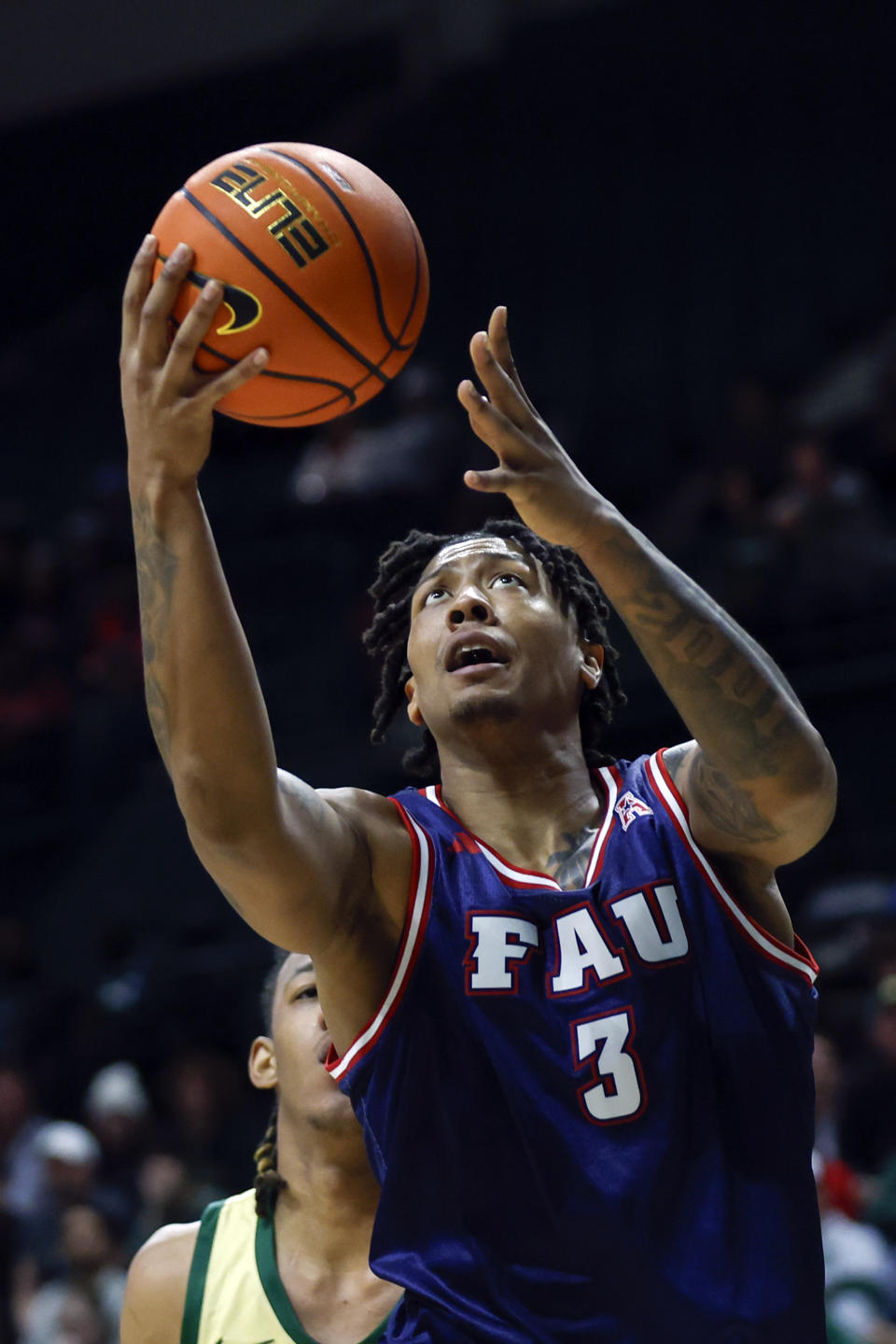 Florida Atlantic forward Giancarlo Rosado drives to the basket against Charlotte during the first half of an NCAA basketball game in Charlotte, N.C., Saturday, Jan. 6, 2024. (AP Photo/Nell Redmond)