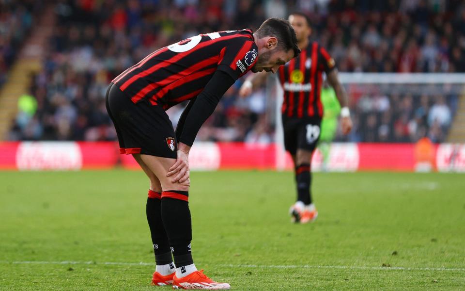 Adam Smith reacts after conceding a penalty for handball.