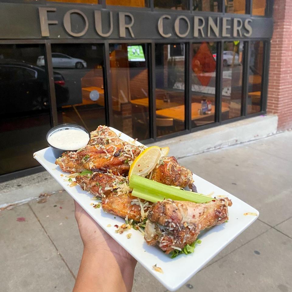 The Four Corners sports restaurant, and their grilled parmesan wings, can be found at 175 E Franklin St. in Chapel Hill, N.C.