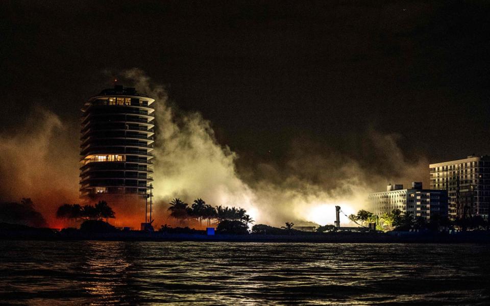 The building after explosives forced the demolition - GIORGIO VIERA/AFP