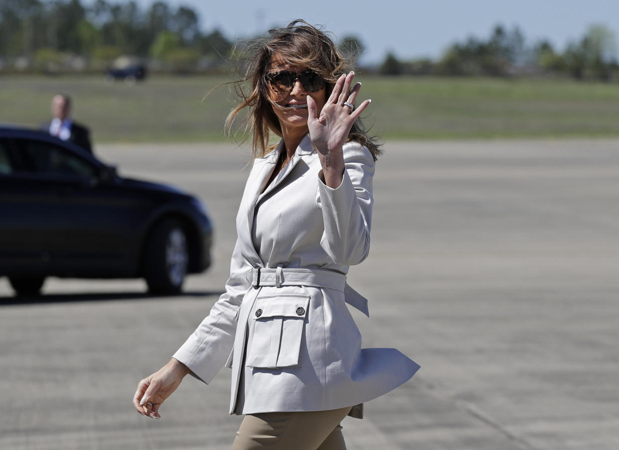 First lady Melania Trump waves as she arrives at Fort Bragg, N.C., Monday, April 15, 2019. (AP Photo/Chuck Burton)