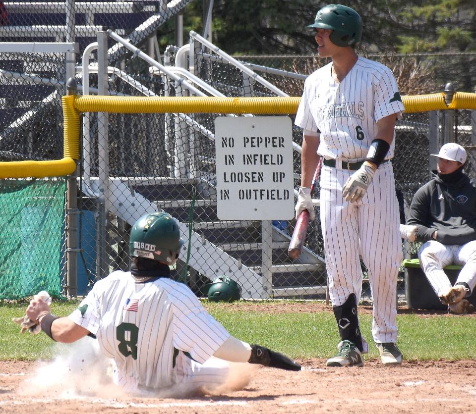 Anthony Raimo Jr (8), pictured stealing home for Herkimer College April 18, 2021, homered for the only Albany hit in a 7-0 Dutchmen victory in the second game of a doubleheader Thursday against the Boonville Baseball Club.