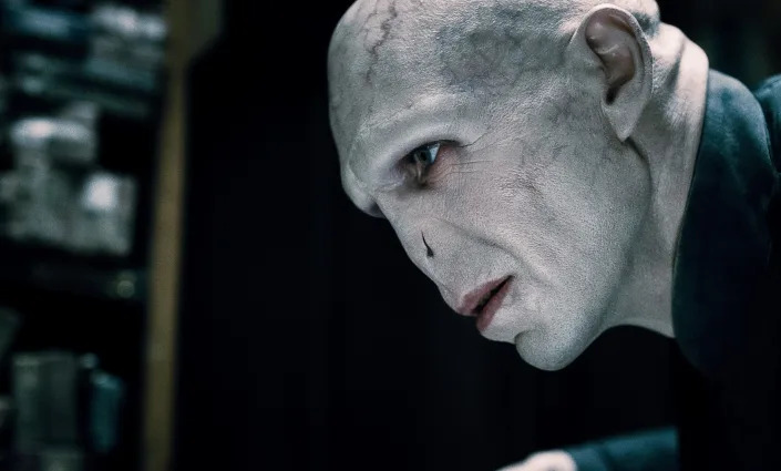 The dark wizard Voldemort (Ralph Fiennes) lords over the wizarding world in "Harry Potter and the Deathly Hallows: Part I."