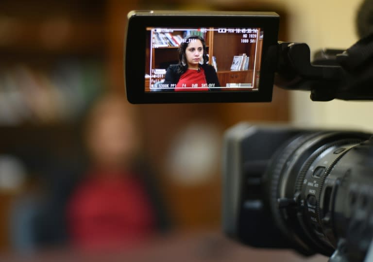 Mozn Hassan, the executive director of a leading women's rights group Nazra for Feminist Studies, is filmed as she speaks to a journalist at her office in the Egyptian capital Cairo