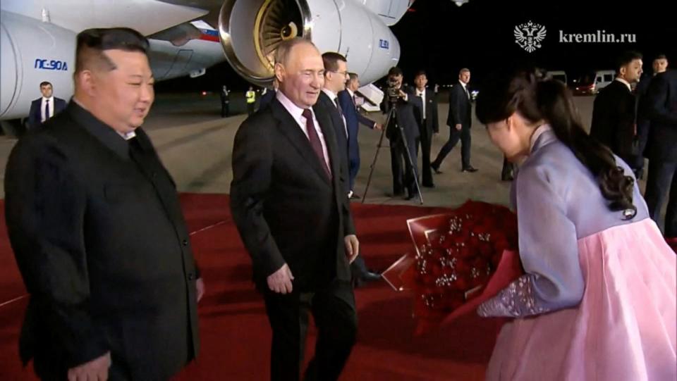 PHOTO: Russia's President Vladimir Putin is greeted by North Korea's leader Kim Jong Un during a welcoming ceremony at an airport in Pyongyang, North Korea June 19, 2024, in this still image taken from video. (Kremlin.ru via Reuters)