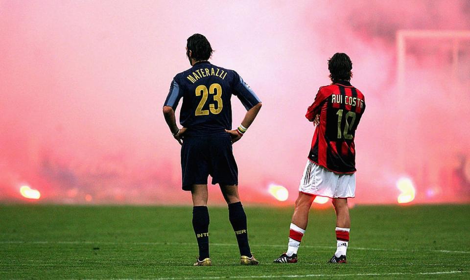 Marco Materazzi and Rui Costa look on during the 2005 Champions League quarter-final (Getty Images)