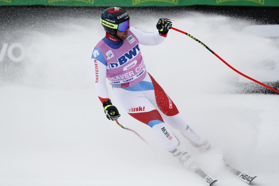 Switzerland's Beat Feuz reacts after his run during a men's World Cup downhill skiing race Saturday, Dec. 7, 2019, in Beaver Creek, Colo. (AP Photo/John Locher)