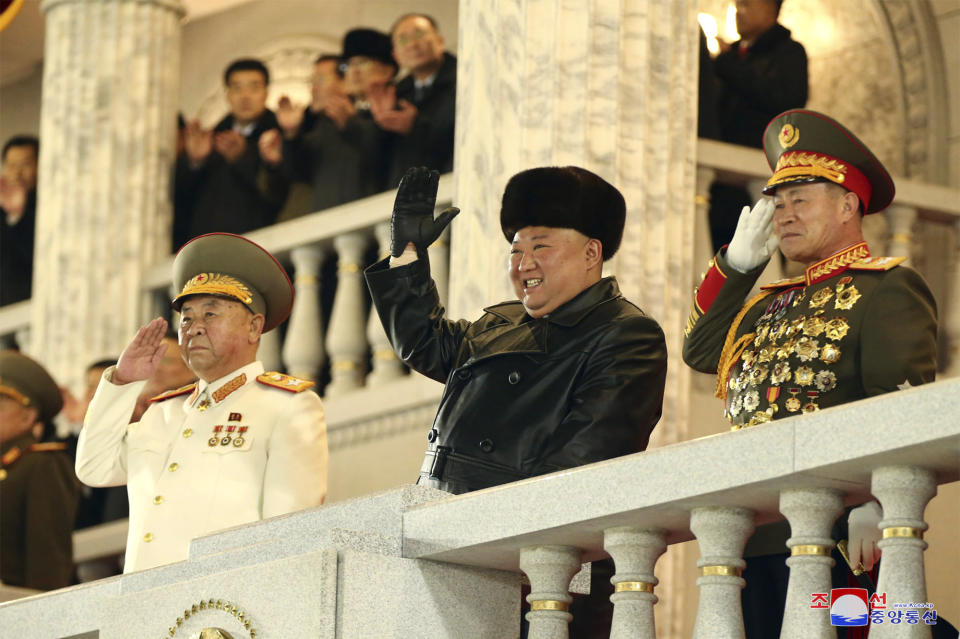 In this photo provided by the North Korean government, North Korean leader Kim Jong Un waves as Kim attended a military parade, marking the ruling party congress, at Kim Il Sung Square in Pyongyang, North Korea Thursday, Jan. 14, 2021. Independent journalists were not given access to cover the event depicted in this image distributed by the North Korean government. The content of this image is as provided and cannot be independently verified. Korean language watermark on image as provided by source reads: "KCNA" which is the abbreviation for Korean Central News Agency. (Korean Central News Agency/Korea News Service via AP)