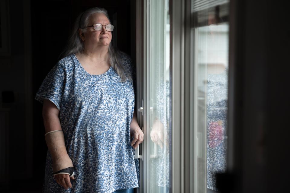 Jennifer Worley of Newton says her 31-year-old daughter Elizabeth has intellectual disabilities and suffered abuse while staying in group homes. Worley has hired aides to take care of her daughter at home.