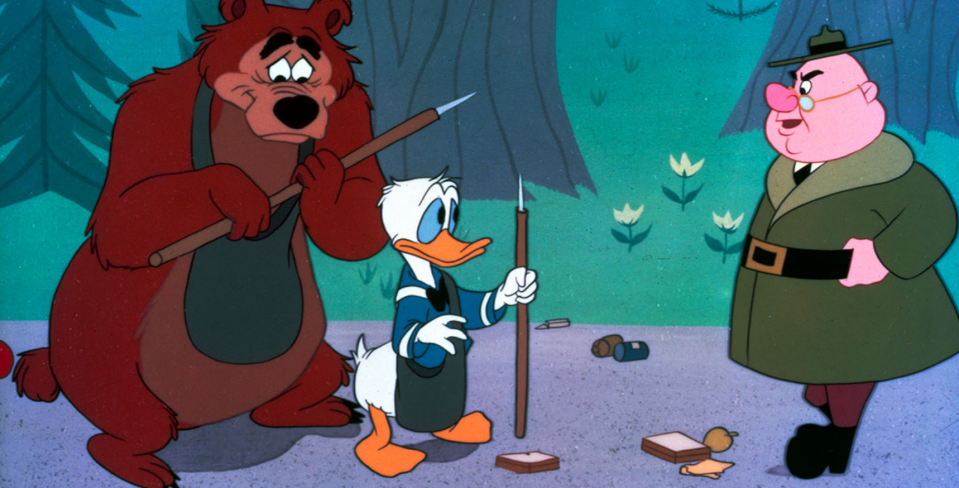 Humphrey the Bear, Donald Duck and J. Audubon Woodlore in the 1954 short <em>Grin and Bear It.</em> (Image: Disney)