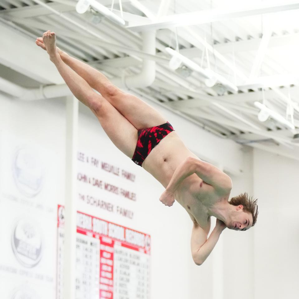 Kenosha Tremper's Evan Arneson performs a dive during the WIAA Division 1 boys state swimming and diving championships at Waukesha South, Saturday, Feb. 17, 2024. Arneson placed second in the event.