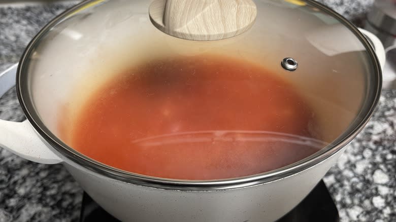 tomato sauce in lidded pot