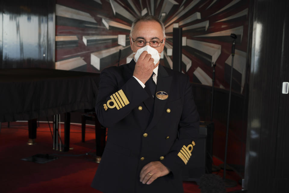 Raffaele Piontecorvo, captain of the MSC Grandiosa cruise ship talks during an interview with the Associated Press, on board the vessel in Civitavecchia, near Rome, Wednesday, March 31, 2021. MSC Grandiosa, the world's only cruise ship to be operating at the moment, left from Genoa on March 30 and stopped in Civitavecchia near Rome to pick up more passengers and then sail toward Naples, Cagliari, and Malta to be back in Genoa on April 6. For most of the winter, the MSC Grandiosa has been a lonely flag-bearer of the global cruise industry stalled by the pandemic, plying the Mediterranean Sea with seven-night cruises along Italy’s western coast, its major islands and a stop in Malta. (AP Photo/Andrew Medichini)