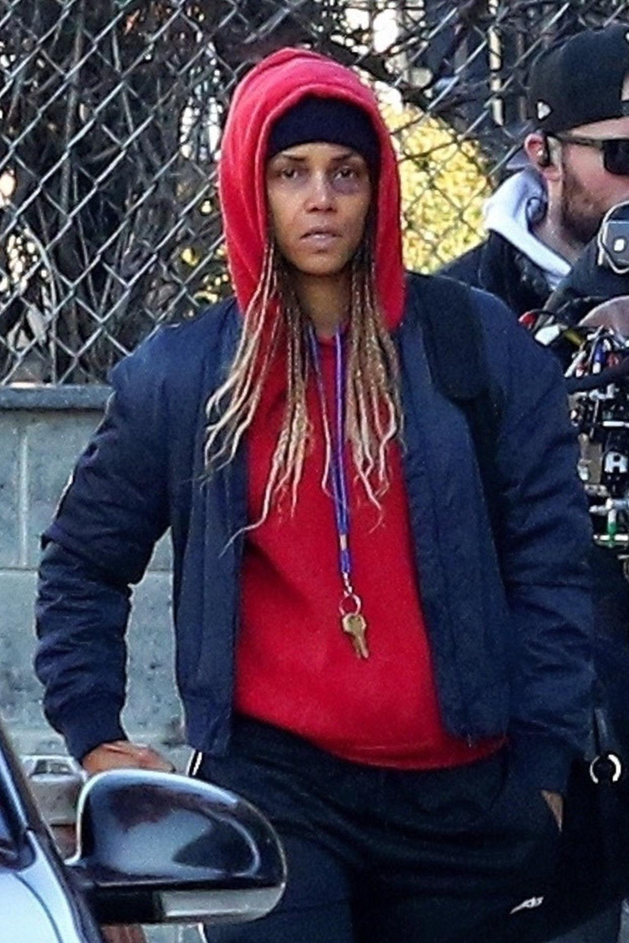 Halle Berry looked every bit the beat-up MMA fighter on the set of her upcoming movie “Bruised” on Dec. 18, 2019 in New Jersey. The actress, who is also the director of the film, sported a large, black eye.