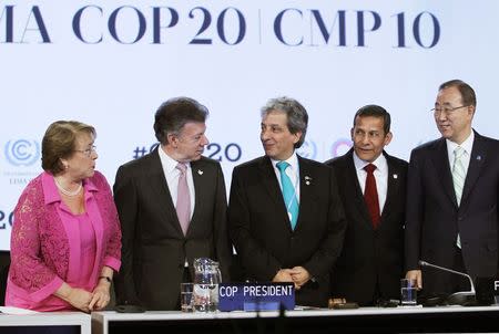 (L to R) Chile's President Michelle Bachelet, Colombia's President Juan Manuel Santos, Peru's Environment Minister Manuel Pulgar Vidal, Peru's President Ollanta Humala and United Nations Secretary-General Ban Ki-moon pose for the media during the High Level Segment of the U.N. Climate Change Conference COP 20 in Lima, December 10, 2014. REUTERS/Enrique Castro-Mendivil
