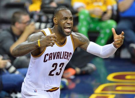 May 25, 2016; Cleveland, OH, USA; Cleveland Cavaliers forward LeBron James (23) reacts in the third quarter against the Toronto Raptors in game five of the Eastern conference finals of the NBA Playoffs at Quicken Loans Arena. Mandatory Credit: David Richard-USA TODAY Sports