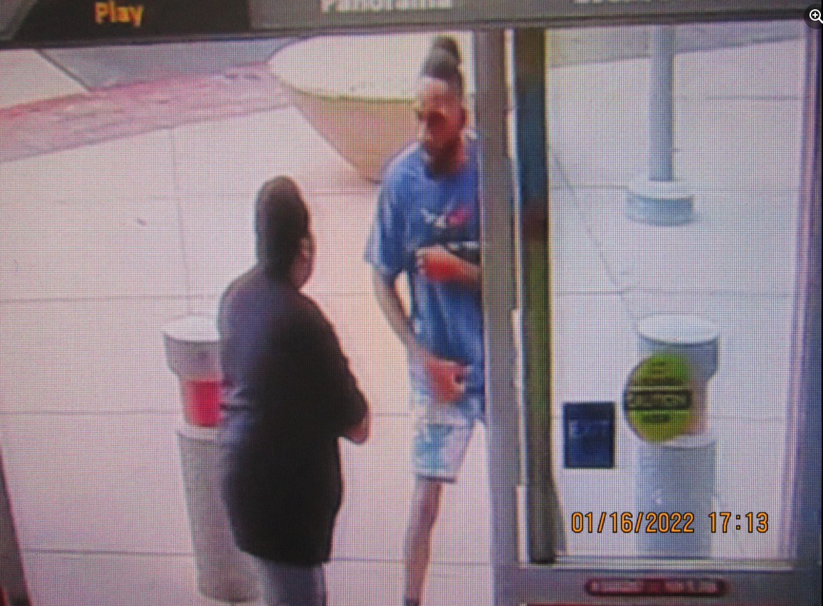 Security camera footage shows two men police are seeking after a reported shooting on Sunday, Jan. 16, 2022,  outside the Smart and Final store at East Ramon Road and Gene Autry Trail in Palm Springs, Calif.