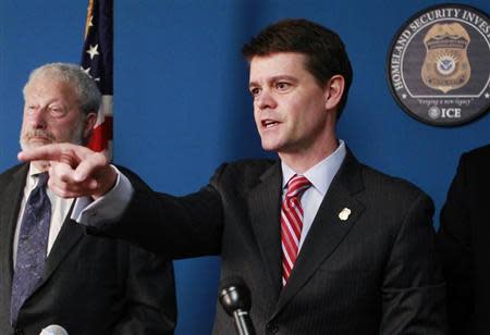 U.S. Immigration and Customs Enforcement Director John Morton (R) answers questions from the media next to U.S. Holocaust Memorial Museum Senior Advisor on Archives Henry Mayer during a news conference to announce the recovery of the diary of Nazi leader Alfred Rosenberg in Wilmington, Delaware, June 13, 2013. REUTERS/Tim Shaffer