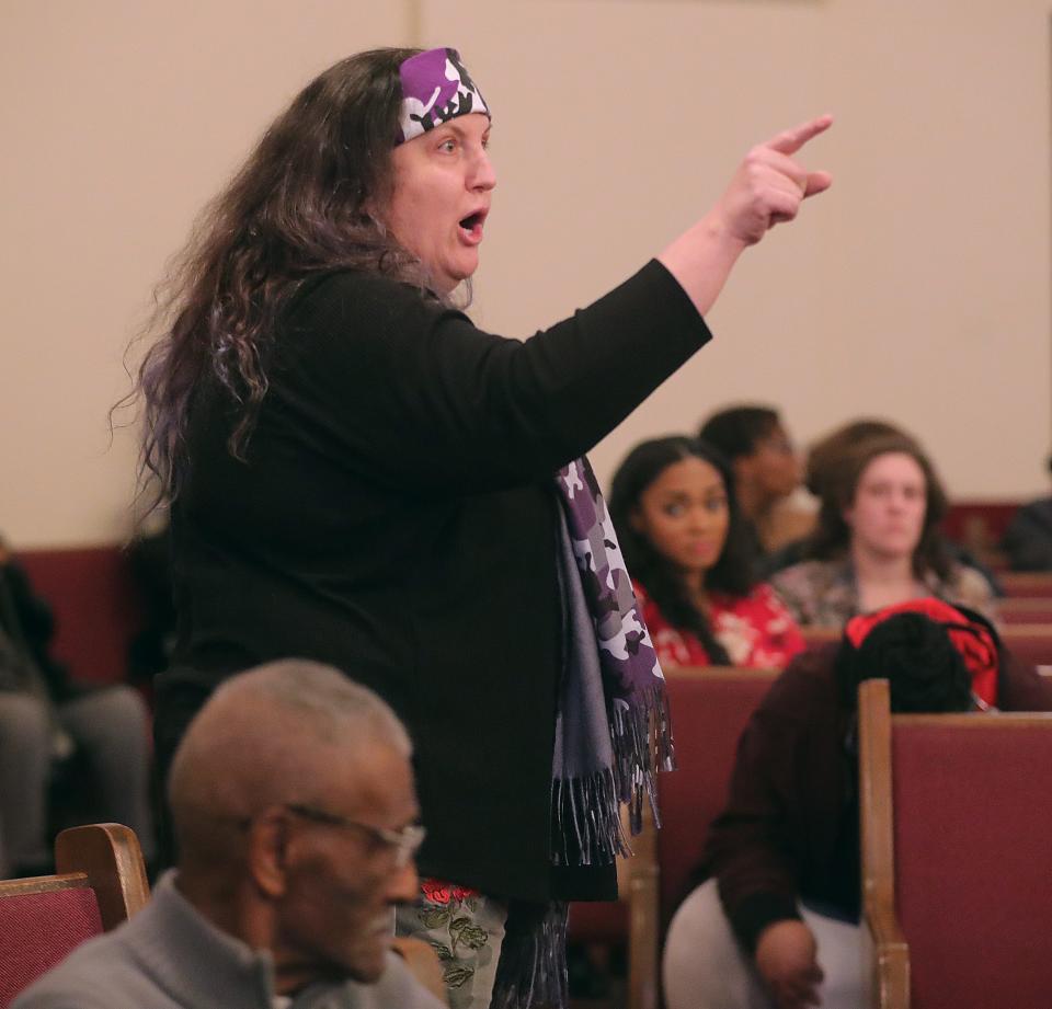 Kimberlee Vaughn, whose husband Mohammad Isaifan was shot by Akron Police in 2019, talks about the incident during a community conversation Wednesday at New Hope Baptist Church.