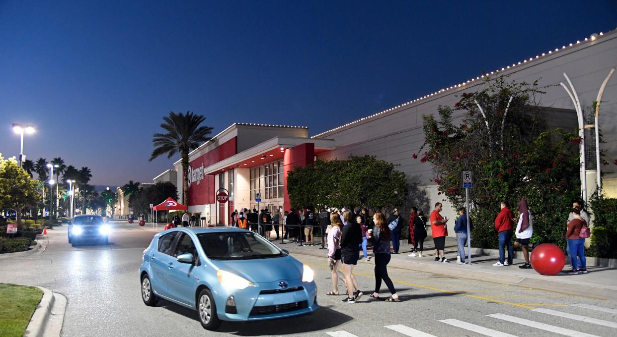 Black Friday's early morning shoppers line up at UTC's Target University Parkway Store, located in the West District shopping area of University Town Center's mall in Sarasota.