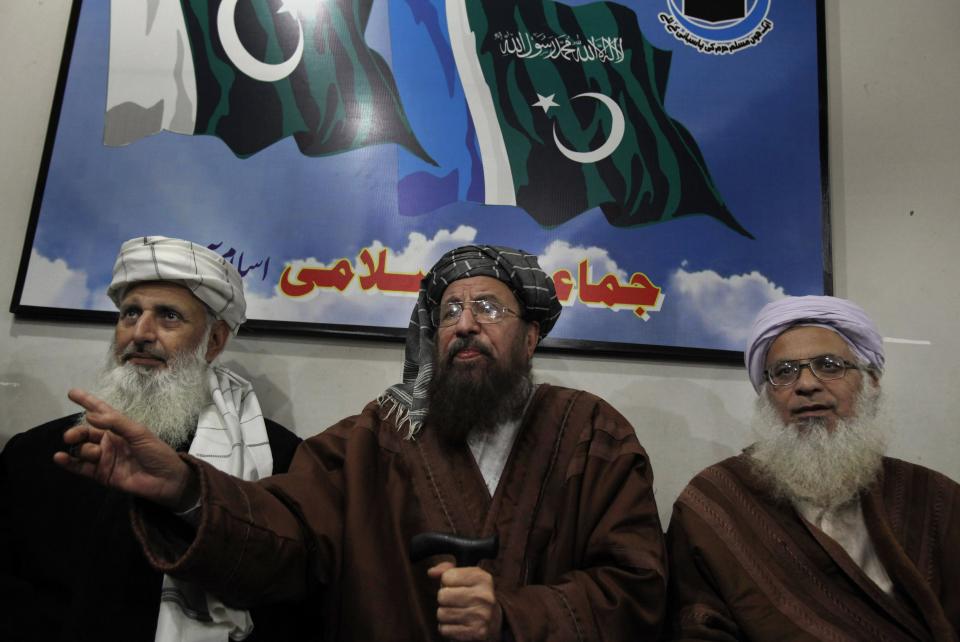 Pakistani religious clerics and members of Taliban's negotiating committee, from left to right, Professor Ibrahim Khan, Maulana Sami-ul-Haq, and Maulana Abdul Aziz, answer a question during their press conference in Islamabad, Pakistan, Tuesday, Feb. 4, 2014. A three-member committee appointed by Pakistani Taliban to hold peace talks with Pakistan has accused its Pakistani counterparts of scuttling the peace process by not turning up for the first round of talks in the capital. (AP Photo/Anjum Naveed)