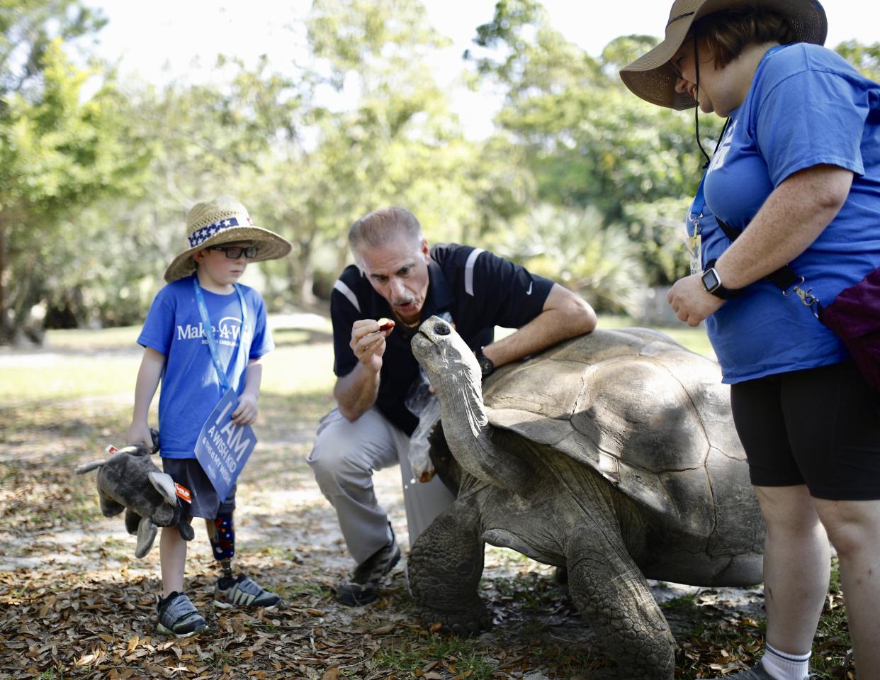 Dale Zimmerman, Ron Magill and Heidi Zimmerman at Zoo Miami on Monday, March 18, 2024.