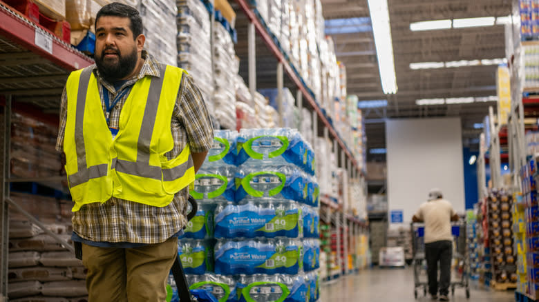 Sam's Club employee restocks water