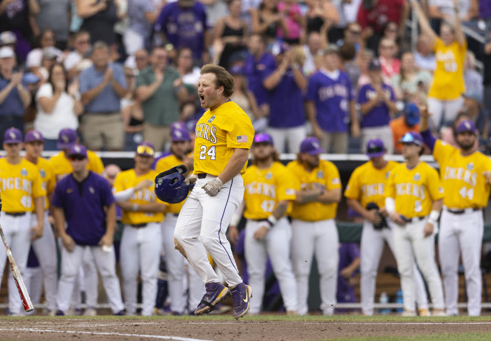 Cade Beloso celebrates after hitting the go-ahead home run in the 11th inning. (AP Photo/Rebecca S. Gratz)