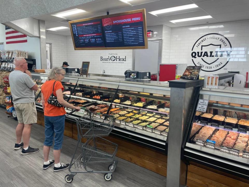 Customers browse the new Fareway deli window on Wednesday afternoon in the Northland.