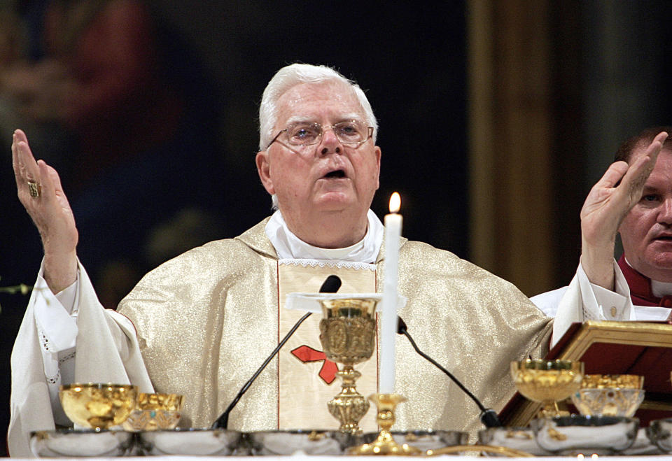 An official with the Catholic Church said Tuesday, Dec. 19, 2017, that Cardinal Bernard Law, the disgraced former archbishop of Boston, has died at 86. Law stepped down under pressure in 2002 over his handling of clergy sex abuse cases. (AP Photo/Domenico Stinellis, File)