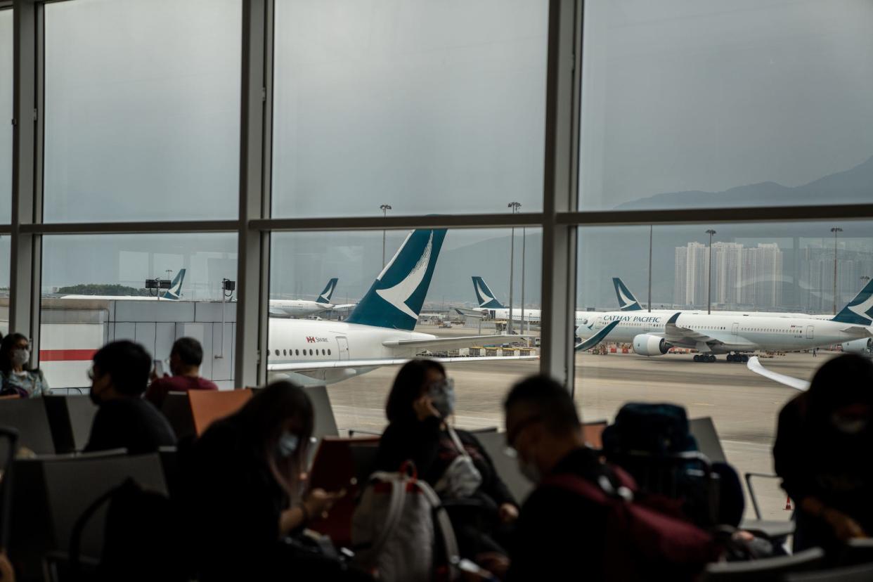 Cathay Pacific plans on the runway at Hong Kong airport.