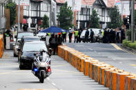 A motorcade believed to be carrying North Korea's leader Kim Jong Un travels past in Singapore June 10, 2018, ahead of the summit between the North Korean leader and U.S. President Donald Trump. REUTERS/Tyrone Siu