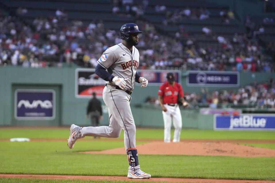 Houston Astros' Yordan Alvarez runs toward home to score on his home run against the Boston Red Sox during the first inning of a baseball game Tuesday, Aug. 29, 2023, in Boston. (AP Photo/Steven Senne)