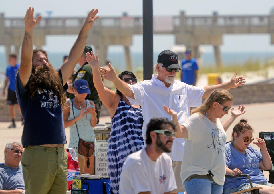 Fans listen to worship music during a past Family Beach Fest at Pensacola Beach.