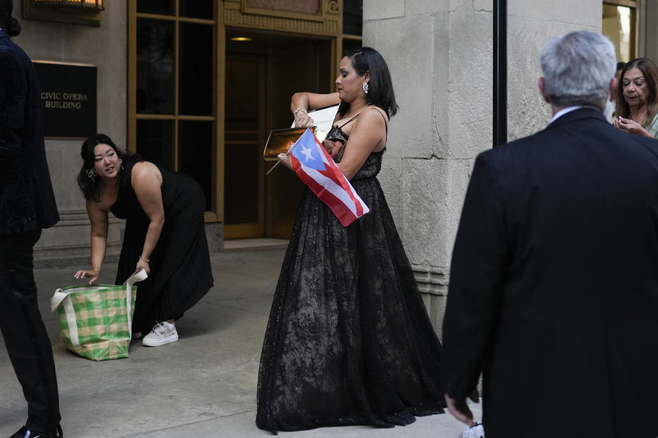 People arrive for the James Beard Awards Monday, June 10, 2024, at the Civic Opera House in Chicago. (AP Photo/Erin Hooley)