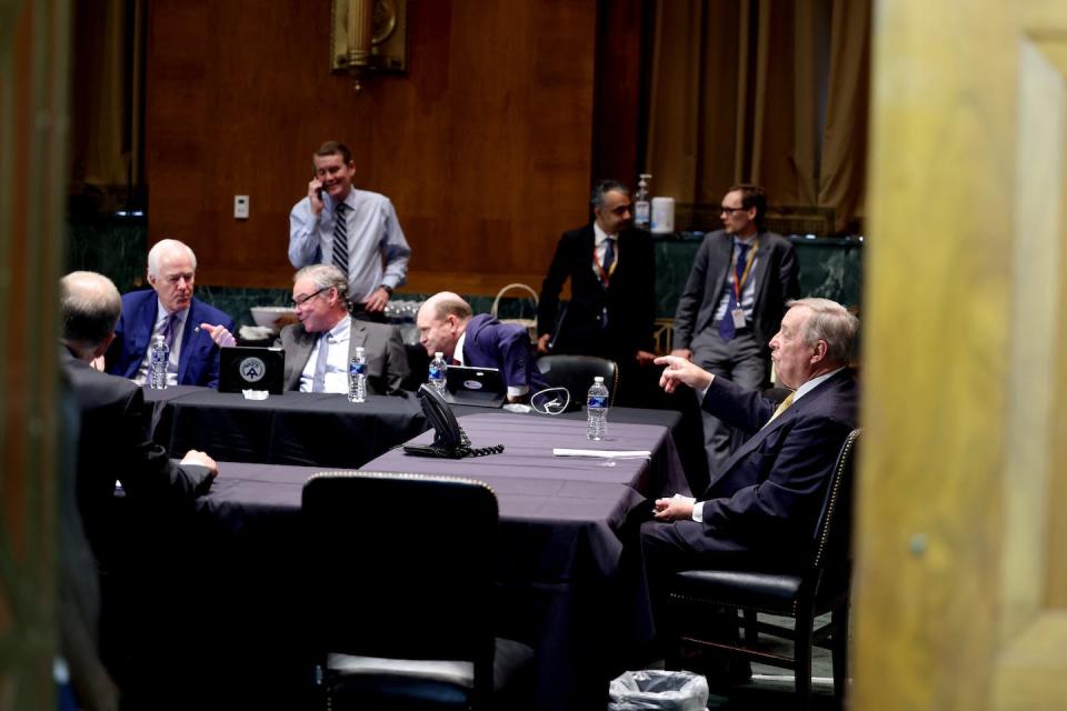 A bipartisan group of senators gathered to discuss immigration reform in the Dirksen Senate Office Building on June 9, 2021, in Washington. <a href="https://www.gettyimages.com/detail/news-photo/sen-john-cornyn-sen-tim-kaine-sen-michael-bennet-sen-chris-news-photo/1322756034?phrase=Senators%20discuss%20bipartisan&adppopup=true" rel="nofollow noopener" target="_blank" data-ylk="slk:Anna Moneymaker/Getty Images;elm:context_link;itc:0;sec:content-canvas" class="link ">Anna Moneymaker/Getty Images</a>