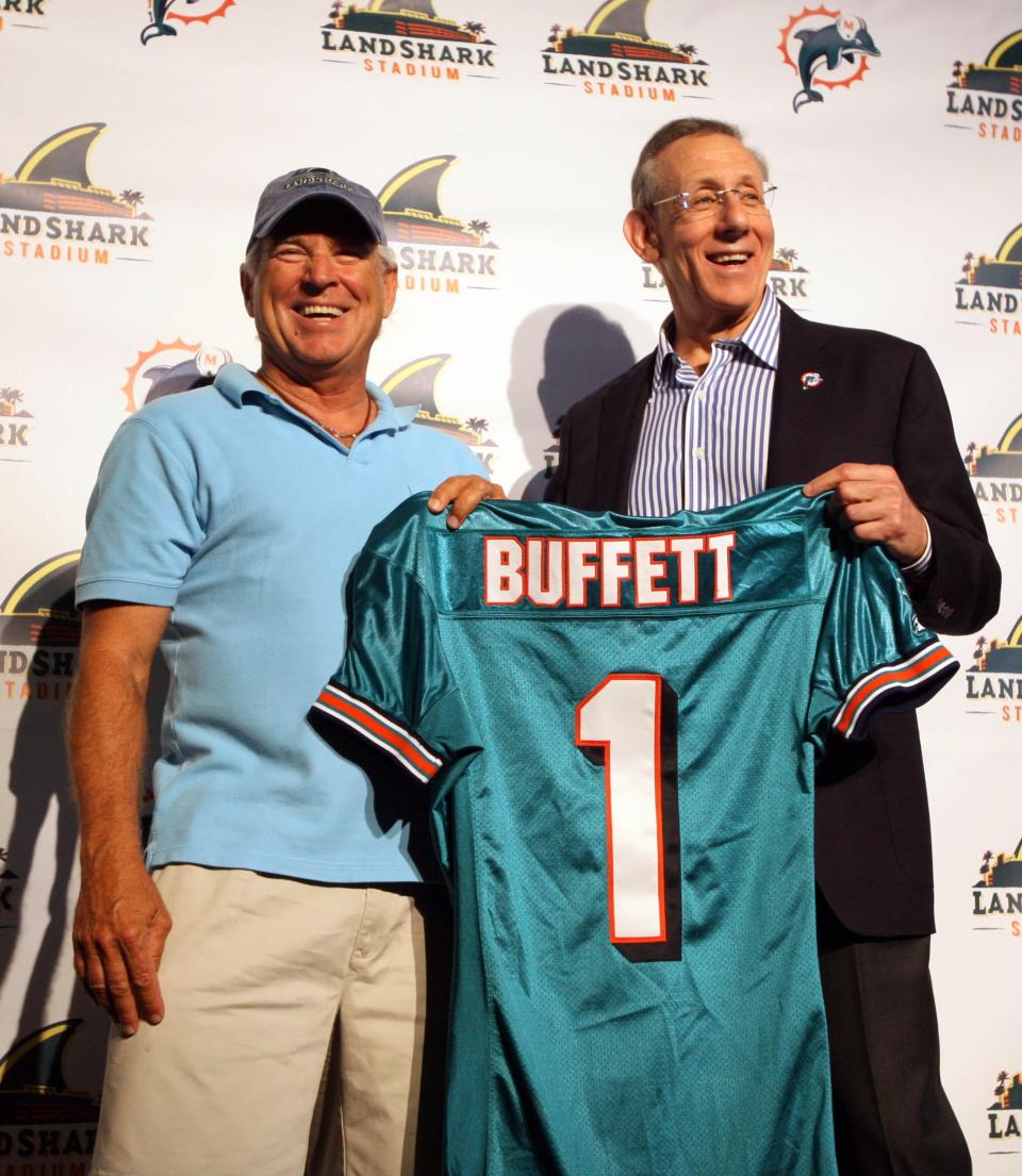 Jimmy Buffet with Dolphins owner Stephen Ross at Landshark Stadium.