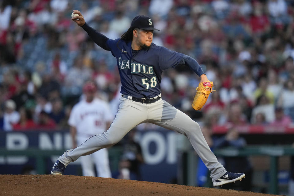 Seattle Mariners starting pitcher Luis Castillo (58) throws during the first inning of a baseball game against the Los Angeles Angels in Anaheim, Calif., Friday, Aug. 4, 2023. (AP Photo/Ashley Landis)