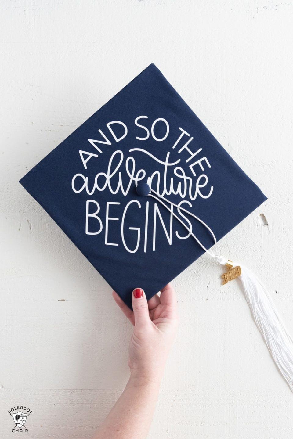 <p>To add a vinyl design to your graduation cap that’s sure to stand out against the solid hue, follow these handy steps. </p><p><strong>Get the tutorial at <a href="https://www.polkadotchair.com/diy-graduation-cap-decoration/" rel="nofollow noopener" target="_blank" data-ylk="slk:Polka Dot Chair;elm:context_link;itc:0;sec:content-canvas" class="link ">Polka Dot Chair</a>.</strong></p>