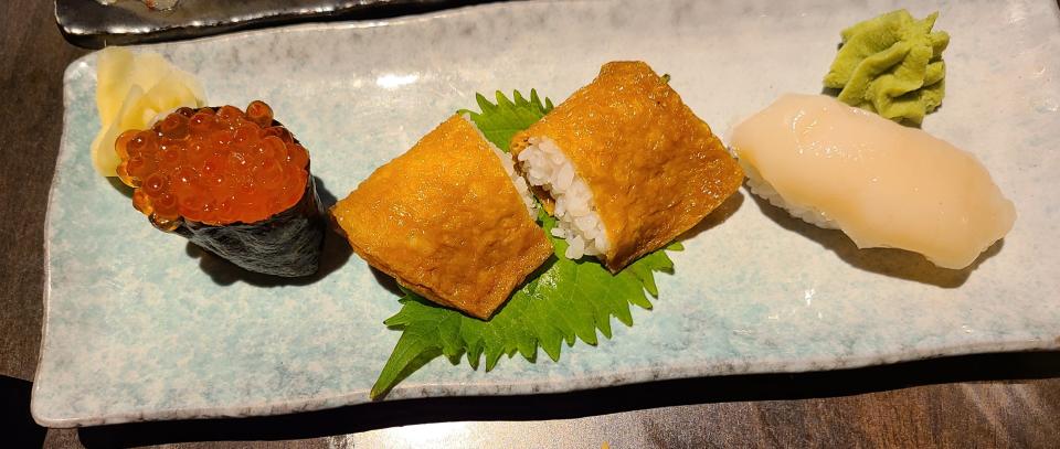 Nigiri: Ikura (salmon roe), $7, inari (tofu), $7, hotate (scallop), $8