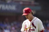 St. Louis Cardinals relief pitcher Giovanny Gallegos leaves the game after giving up a two-run home run to Chicago Cubs' Rafael Ortega during the eighth inning of a baseball game Saturday, June 25, 2022, in St. Louis. (AP Photo/Jeff Roberson)