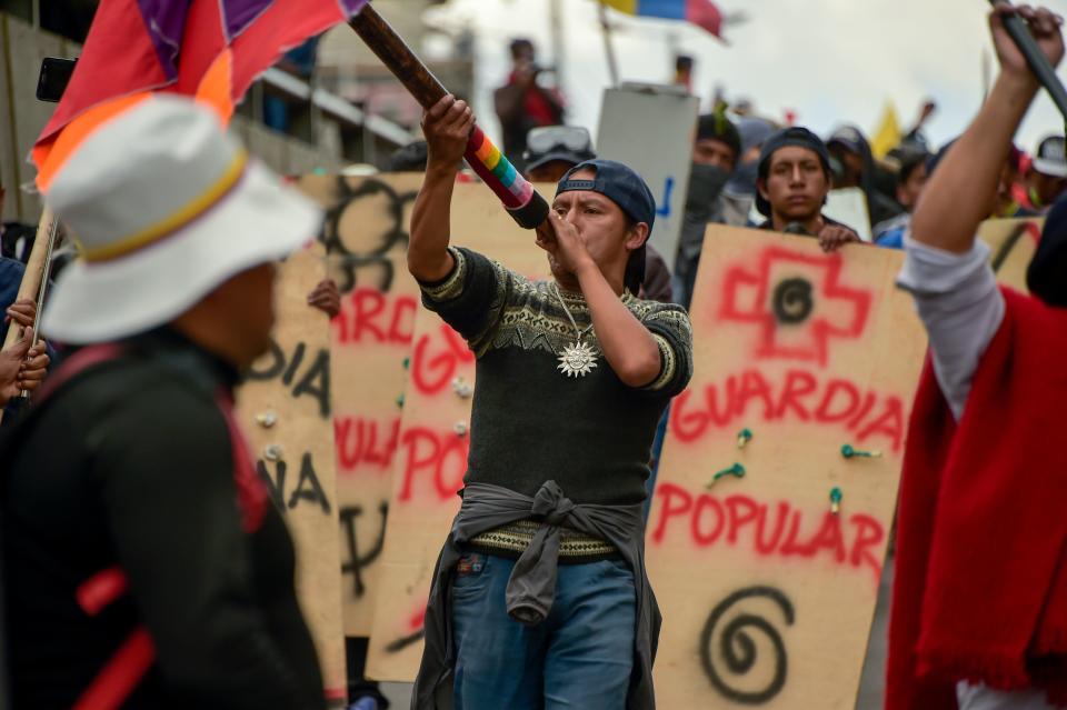 Protesters march against the sharp rise in fuel prices sparked by authorities' decision to scrap subsidies in Quito on Oct. 9, 2019. (Photo: Rodrigo Buendia/AFP via Getty Images)