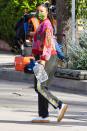 <p>Gabrielle Union carries a water jug as she leaves the set of <em>Cheaper by the Dozen </em>on Thursday in L.A. </p>