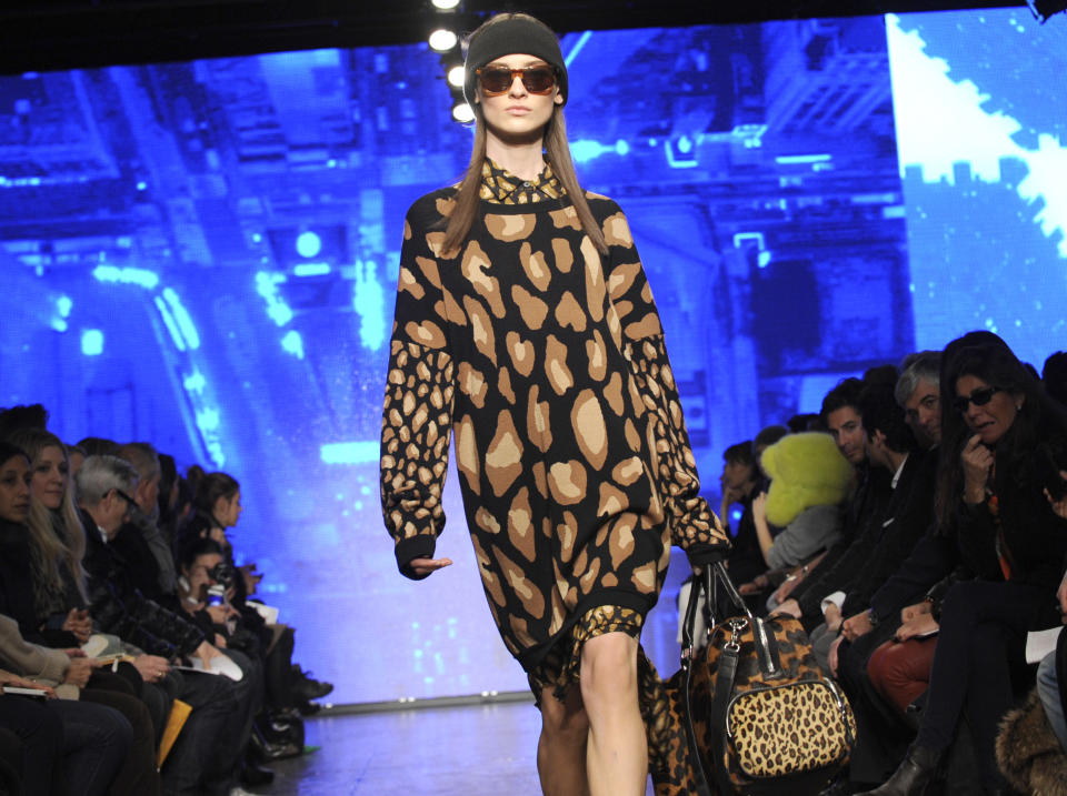 The DKNY Fall 2013 collection is modeled during Fashion Week, Sunday, Feb. 10, 2013, in New York. (AP Photo/Louis Lanzano)