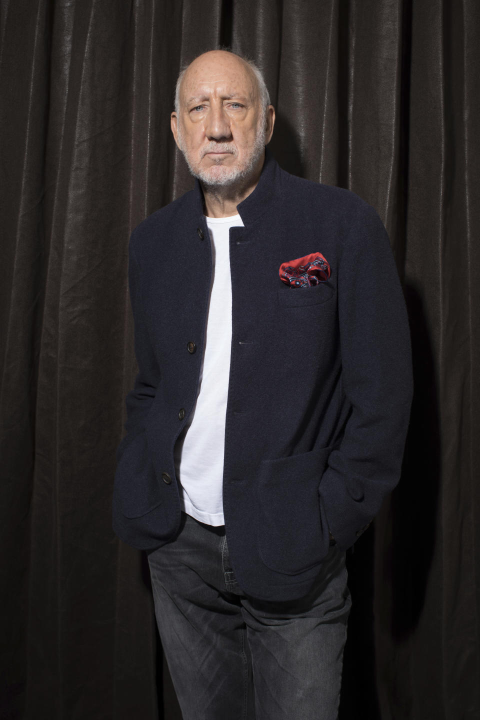 This Oct. 31, 2019 photo shows author-singer Pete Townshend posing for a portrait in New York to promote his debut novel "The Age of Anxiety." Townshend, a member of the British rock band The Who, said the band plans to return to Cincinnati for the first time since the 1979 tragedy where 11 fans died in a frantic stampede at their concert. (Photo by Matt Licari/Invision/AP)