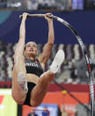 FILE - In this Sept. 29, 2019, file phto, Alysha Newman, of Canada, competes in the women's pole vault final at the World Athletics Championships in Doha, Qatar. Three of the leading women’s pole vaulters will take their turn to compete in the second edition of the Ultimate Garden Clash. Katerina Stefanidi of Greece, Katie Nageotte of the United States and Alysha Newman of Canada will participate in the event but won’t be competing in their backyards since they don’t have the equipment at home. They will instead be at nearby training facilities. (AP Photo/Hassan Ammar, File)