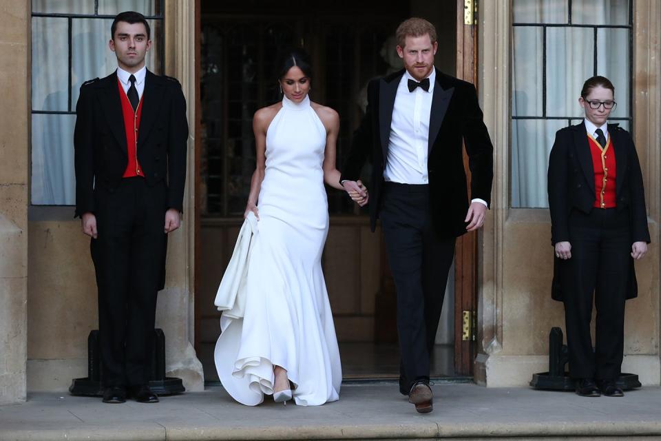 <p>Meghan reportedly broke royal protocol by <a href="https://www.marieclaire.com/celebrity/a20763519/meghan-markle-prince-harry-wedding-reception-news/" rel="nofollow noopener" target="_blank" data-ylk="slk:giving a speech at her and Harry’s reception;elm:context_link;itc:0;sec:content-canvas" class="link ">giving a speech at her and Harry’s reception</a>. The speech was directed at her royal in-laws for welcoming her into the family. </p>